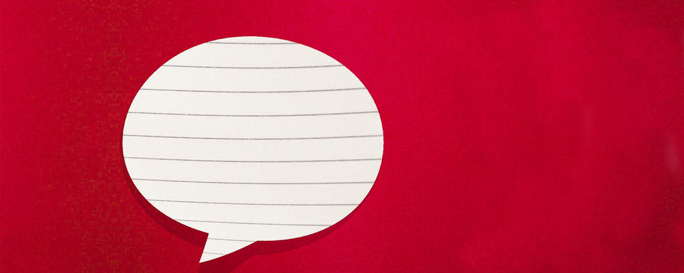 Speech bubble made of lined paper on a red background